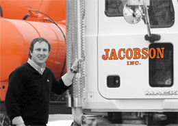 Vice president Lorin Jacobson poses with concrete / cement mixer truck in Pauls Valley Oklahoma